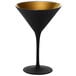 A Stolzle black martini glass with a gold rim and base.