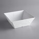 An American Metalcraft white faux slate square melamine bowl on a gray background.