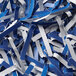 A pile of blue and white shredded paper.