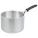 A Vollrath Wear-Ever aluminum saucepan with a black silicone handle.