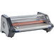 A Swingline Ultima 65 laminator with a roll of paper on it.