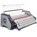 A Swingline Ultima 65 Thermal Roll Laminator with a roll of paper.
