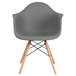 A grey plastic Flash Furniture Alonza chair with wooden legs.