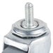 A close up of a Manitowoc swivel caster wheel with a metal nut on it.