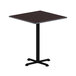 An Alera square table with an espresso/walnut reversible top on a table with a black base.