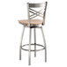 A metal bar stool with a natural wood seat and a clear coat finish.