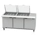 A Beverage-Air stainless steel sandwich prep table with 3 doors open on a counter.