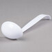 A white plastic ladle with a long handle.