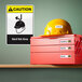 A package of Avery rectangle sign labels with a yellow hard hat on a red tool box.