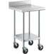 A silver stainless steel Regency work table with black wheels.