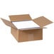 A cardboard box with white sheets of Avery Waterproof White Mailing Labels.