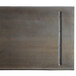 A rectangular wood table top with a metal bar.