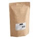 A brown bag of Numi Organic Jasmine Pearls green loose leaf tea with a white label.