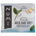 A package of Numi Organic Aged Earl Grey Tea Bags with an orange peel on a white background.