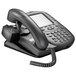 A close-up of a black Plantronics telephone with a cord attached.