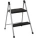 A black and silver Cosco two-step folding step stool.