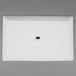 A white rectangular porcelain plate with a black label on a white background.