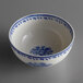 A white Oneida porcelain bowl with blue floral designs.