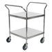 A Regency stainless steel two shelf utility cart with wheels.