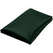 A folded hunter green cloth with a hemmed edge.
