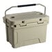 A tan CaterGator outdoor cooler with a handle.