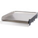 A silver rectangular stainless steel griddle top with a black lid.