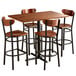 A Lancaster Table & Seating bar table with a wooden top and four chairs.