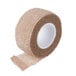A roll of brown Medi-First Rip-N-Wrap self adhesive bandage tape.