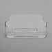 A clear plastic horizontal business card holder.