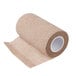 A roll of brown medical bandage with a white background.
