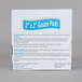 A white Medi-First box with blue text containing 25 sterile 2x2 gauze pads.