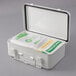 A white plastic container with a white lid and green and white first aid supplies.