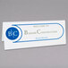 A white C-Line tent card with blue text.