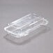 A Dart clear hinged PET plastic small oblong container with a lid.