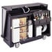 A black Cambro portable bar cart with bottles on it.