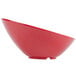 A close-up of a red GET Red Sensation slanted melamine bowl.
