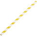 An EcoChoice paper straw with yellow and white stripes.
