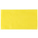 A yellow cloth on a white background.