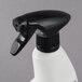 A white spray bottle with a black cap.