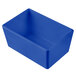 A Tablecraft cobalt blue rectangular container on a white counter.