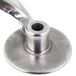 A close-up of a stainless steel dough hook for a Hobart mixer.