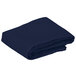 A folded navy blue Intedge square table cover.