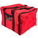 A red Rubbermaid insulated delivery bag with black straps and handles.