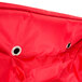 A red Rubbermaid insulated delivery bag with two holes.