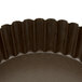 A Gobel fluted deep tart pan with a removable bottom.