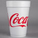 A white Dart foam cup with red Coca-Cola text.