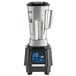 A Waring commercial blender with electronic touchpad controls.
