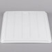 A white Winholt polystyrene display tray with lines.