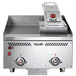 A Vulcan heavy duty electric griddle top with grooved steel plate and knobs.