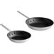A pair of Choice aluminum non-stick frying pans with long handles.